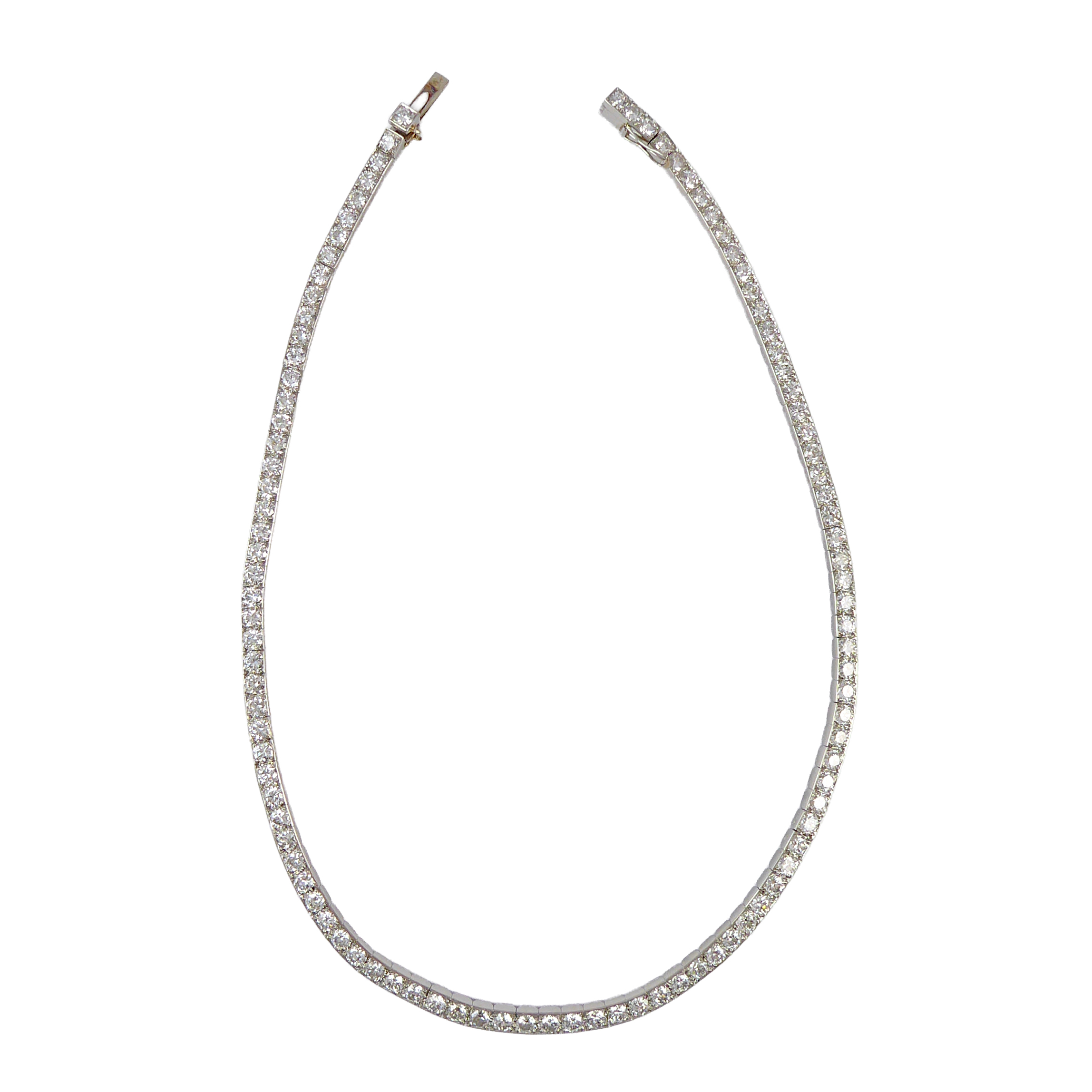 Art Deco diamond line collar necklace by Cartier, Paris, box collet set with slightly graduated round brilliant cut diamonds,